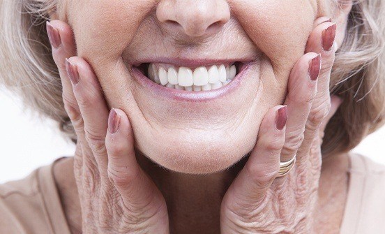 Woman framing her smile