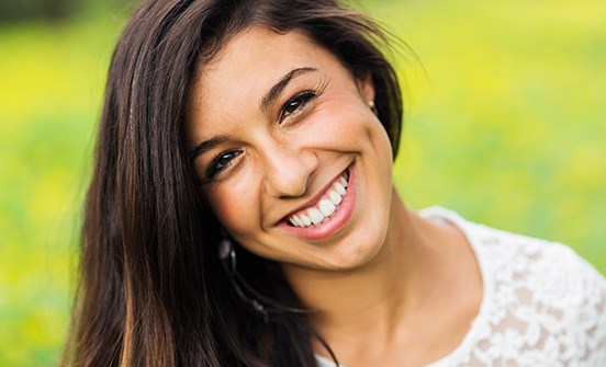 Woman with beautiful smile outdoors