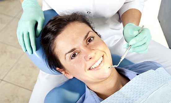 Smiling woman in dental chair