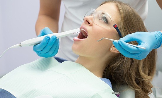 Dentist capturing intraoral images