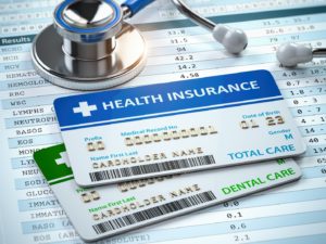 Policy cards for dental insurance and medical insurance