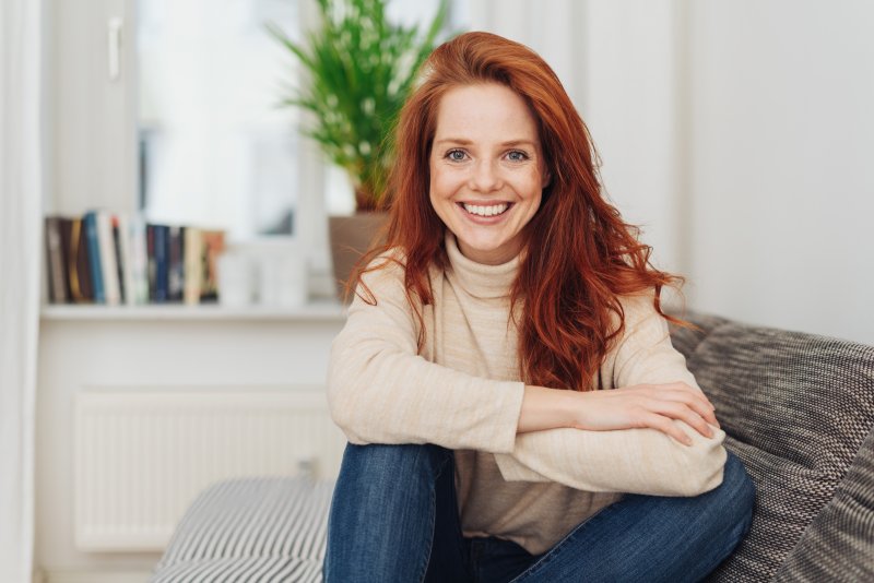 woman with dental crown smiling