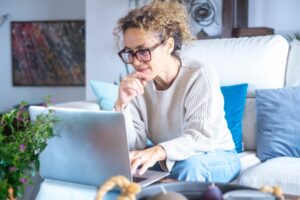 a person doing research online about dental implants